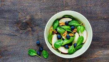 Spinach Salad With Grilled Onions, Avocado, Walnuts, And Apple
